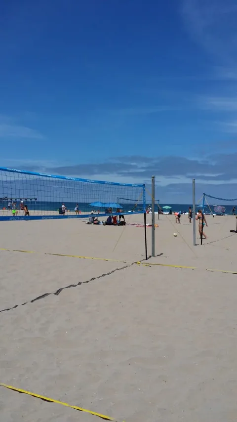 Courts on the sand, a few steps off the water